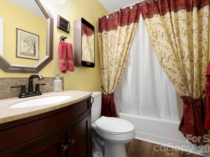 658 Enka Lake Road, Candler, NC 28715.  MLS# CAR4395073, YatesRealty ID 31676. 