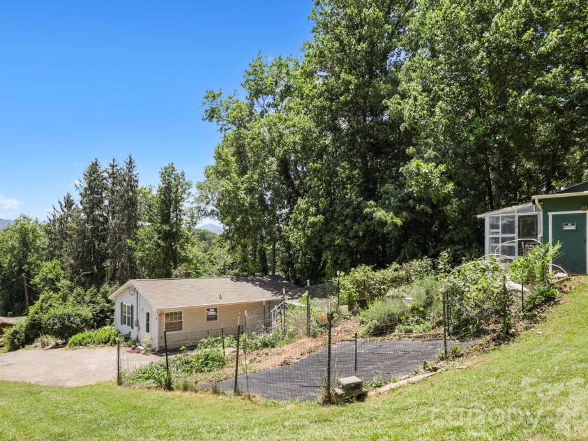 658 Enka Lake Road, Candler, NC 28715.  MLS# CAR4395073, YatesRealty ID 31676. 