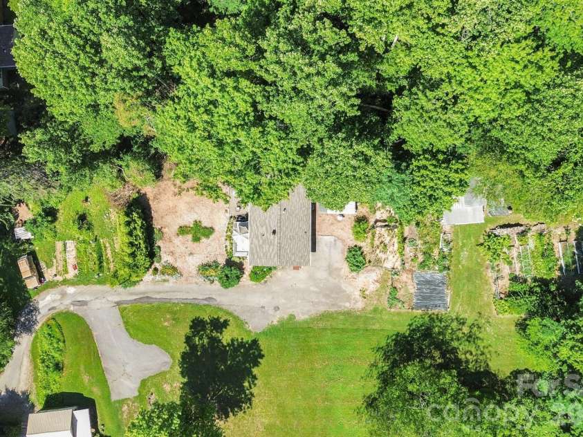 658 Enka Lake Road, Candler, NC 28715.  MLS# CAR4395073, YatesRealty ID 31676. 