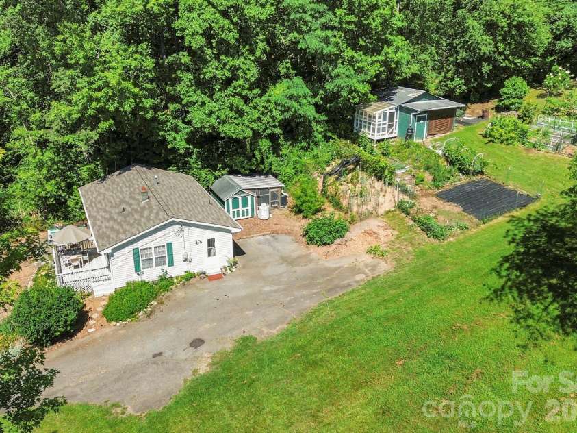 658 Enka Lake Road, Candler, NC 28715.  MLS# CAR4395073, YatesRealty ID 31676. 