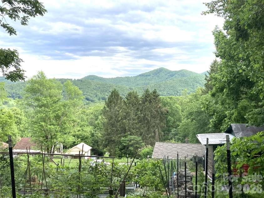 658 Enka Lake Road, Candler, NC 28715.  MLS# CAR4395073, YatesRealty ID 31676. 