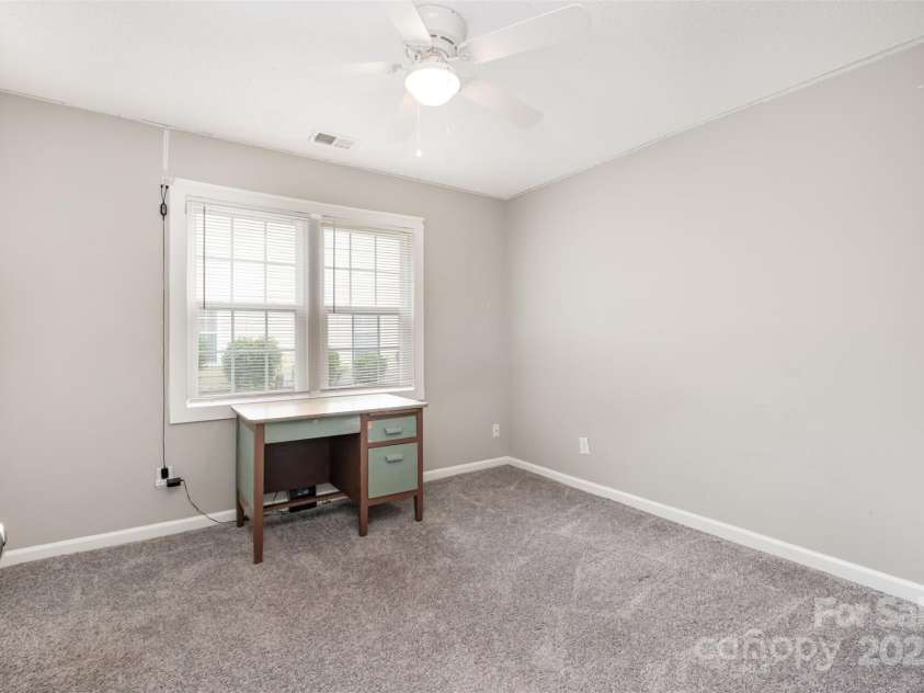 565 Viking Place, Concord, NC 28025.  MLS# CAR4288572, YatesRealty ID 31678. Bedroom 2.  All the bedrooms have new carpet.