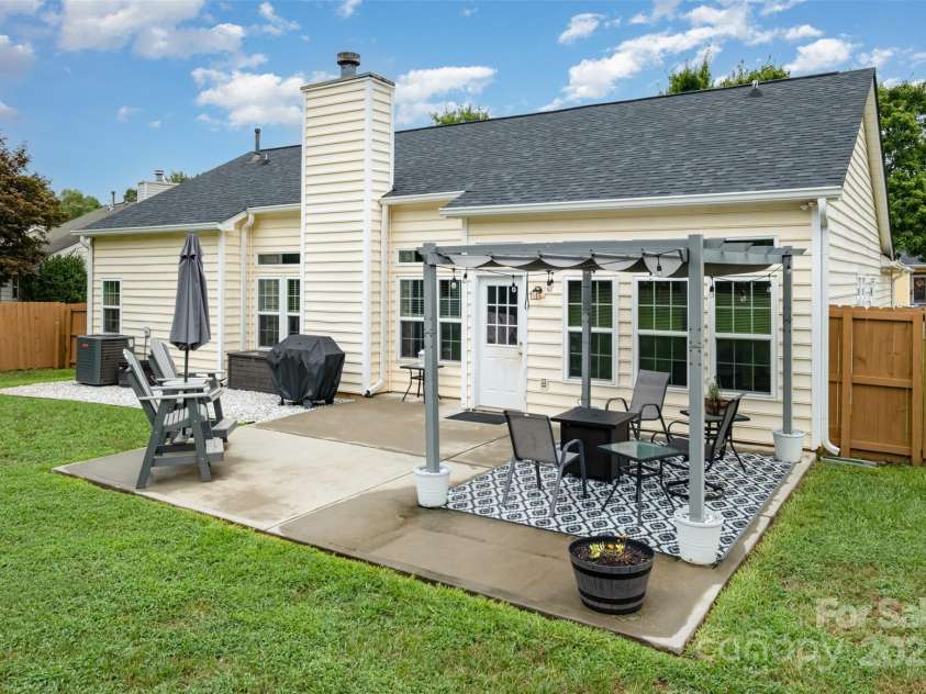 565 Viking Place, Concord, NC 28025.  MLS# CAR4288572, YatesRealty ID 31678. Extra Large pation is great for entertaining and grilling out!