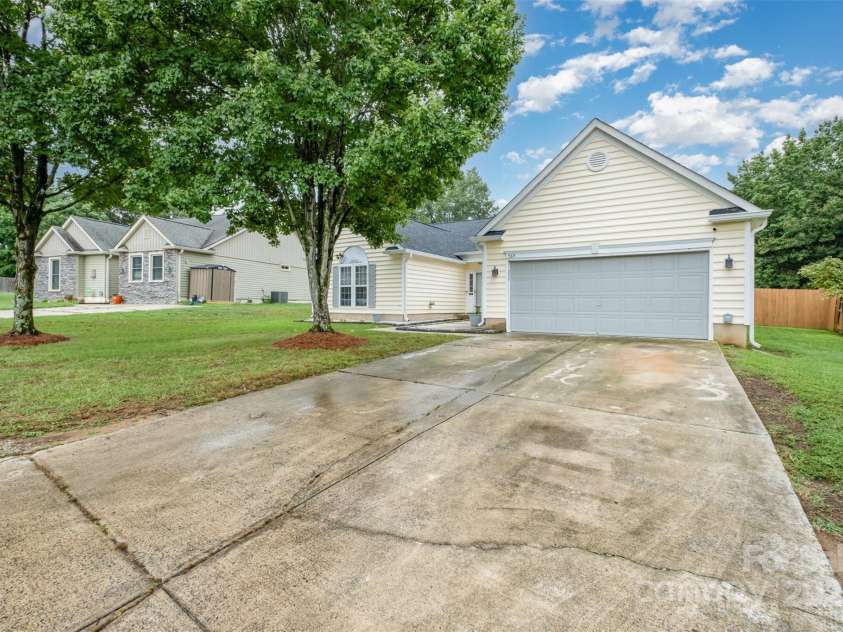 565 Viking Place, Concord, NC 28025.  MLS# CAR4288572, YatesRealty ID 31678. Finished 2 car garage PLUS extra parking for family and friends.  There is also a 30 AMP outlet for a camper!
