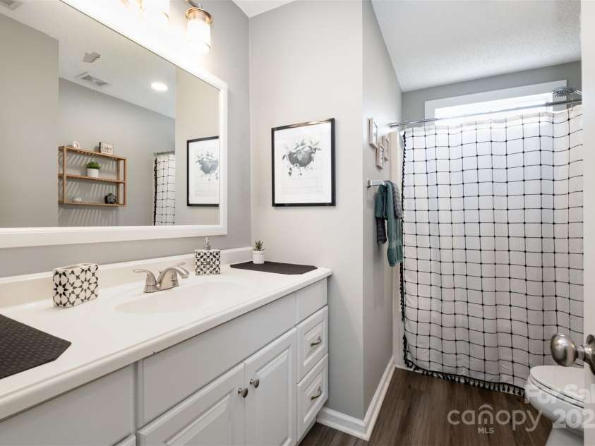 565 Viking Place, Concord, NC 28025.  MLS# CAR4288572, YatesRealty ID 31678. Full Hall Bath has been updated with a New Vanity and Toilet.