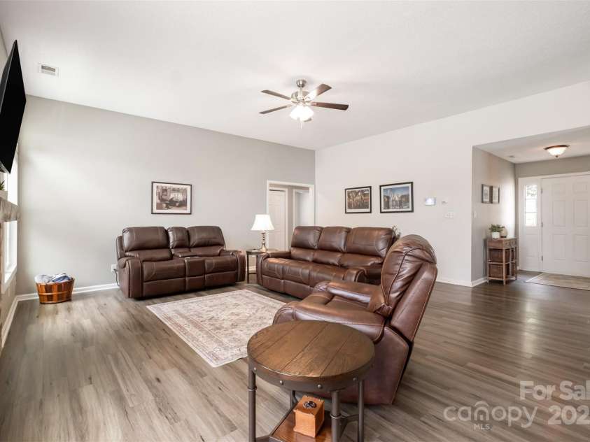 565 Viking Place, Concord, NC 28025.  MLS# CAR4288572, YatesRealty ID 31678. New Beautiful Luxury Plank Flooring through out the home