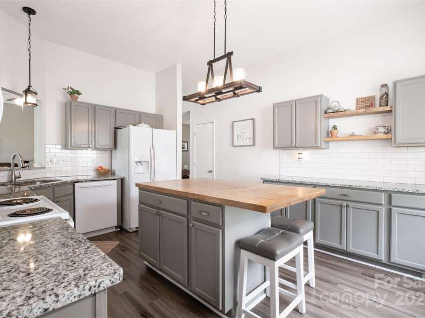 565 Viking Place, Concord, NC 28025.  MLS# CAR4288572, YatesRealty ID 31678. Yes, it even has a more cabinets and counter space with open shelving.....great place for a coffee bar :)