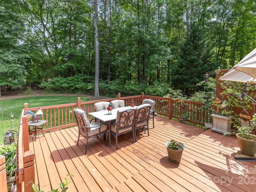 6419 Antioch Court, Matthews, NC 28104.  MLS# CAR4264351, YatesRealty ID 31684. Decked Dining area Exterior