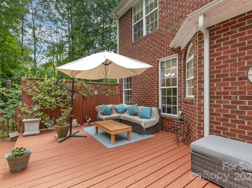 6419 Antioch Court, Matthews, NC 28104.  MLS# CAR4264351, YatesRealty ID 31684. Decked Exterior Conversation seating area