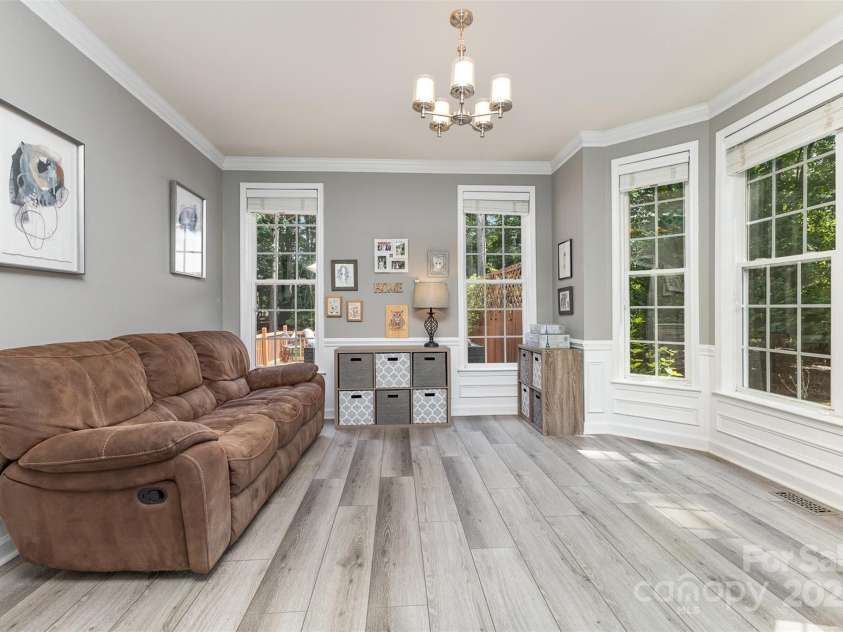6419 Antioch Court, Matthews, NC 28104.  MLS# CAR4264351, YatesRealty ID 31684. Den main level