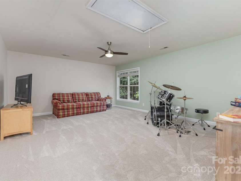 6419 Antioch Court, Matthews, NC 28104.  MLS# CAR4264351, YatesRealty ID 31684. Large Upper Bonus Room