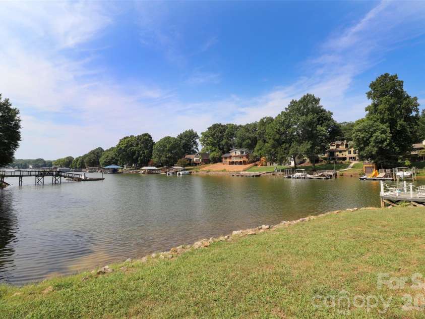 118 Waterfowl Lane, Mooresville, NC 28117.  MLS# CAR4370687, YatesRealty ID 31685. Shoreline protected by rip rap.