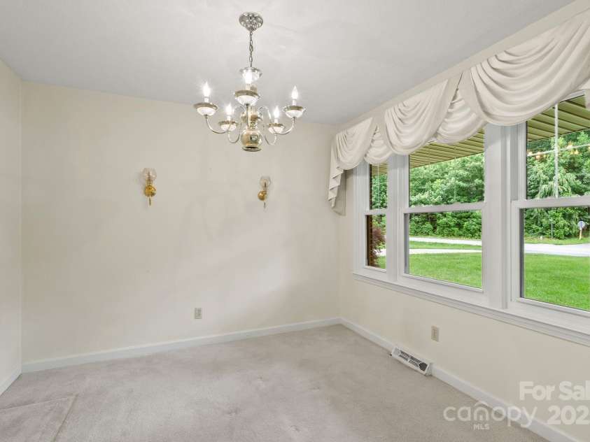 6693 Brevard Road, Etowah, NC 28729.  MLS# CAR4286543, YatesRealty ID 31689. 