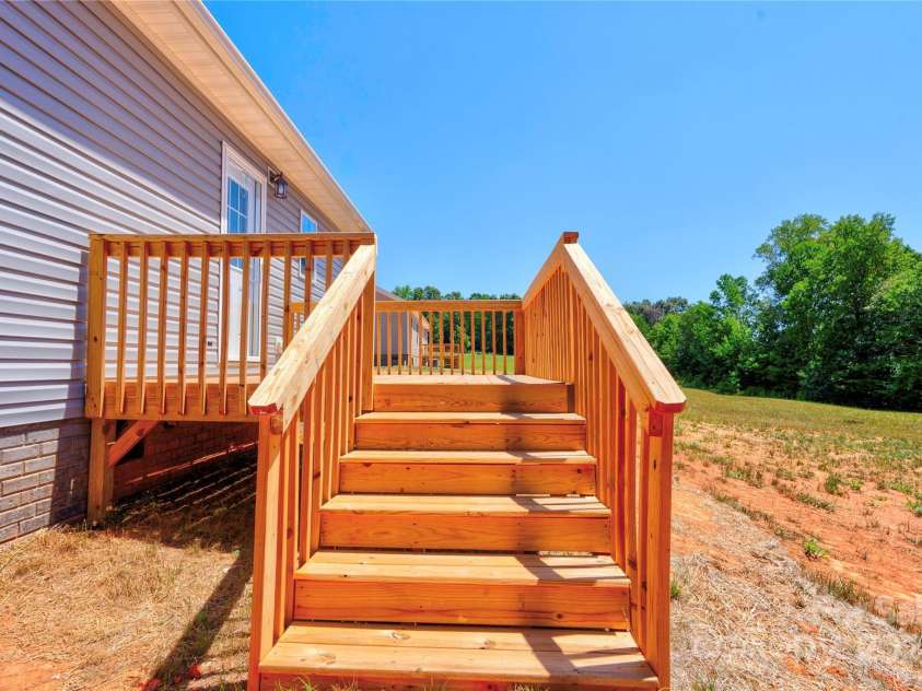 222 Buck Chapman Road, Casar, NC 28020.  MLS# CAR4112298, YatesRealty ID 3169. Back Deck