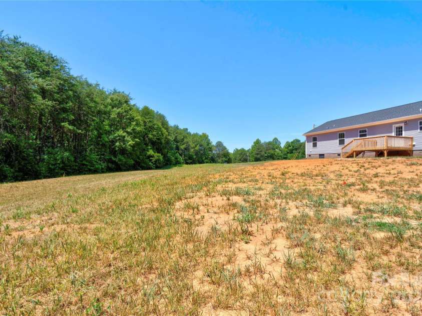 222 Buck Chapman Road, Casar, NC 28020.  MLS# CAR4112298, YatesRealty ID 3169. Back yard