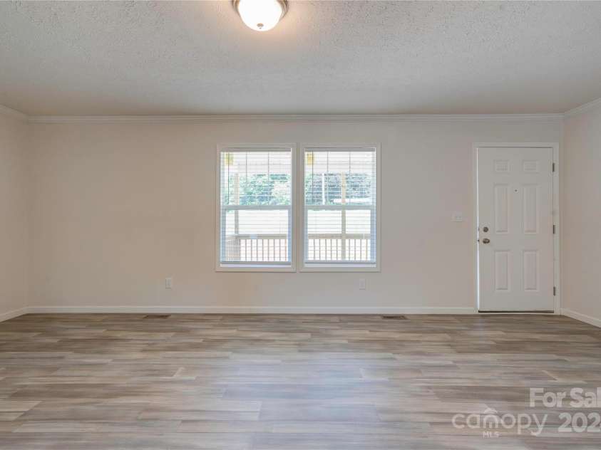 222 Buck Chapman Road, Casar, NC 28020.  MLS# CAR4112298, YatesRealty ID 3169. Living Room/Front Entry