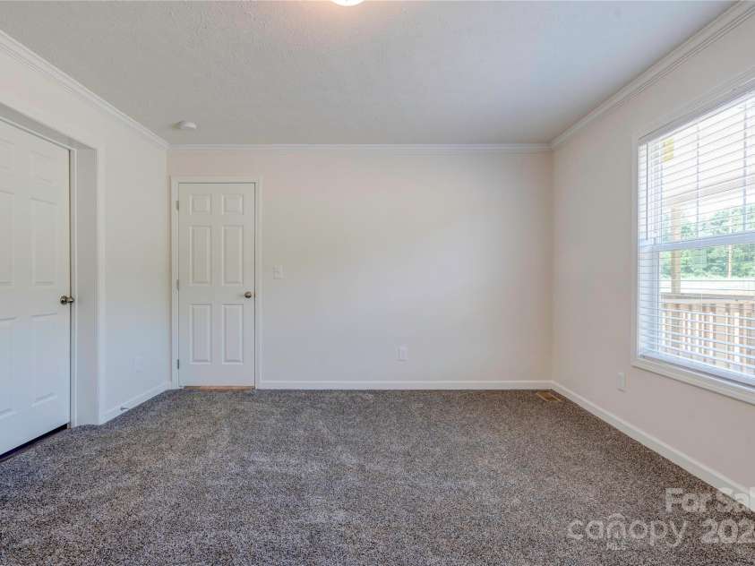 222 Buck Chapman Road, Casar, NC 28020.  MLS# CAR4112298, YatesRealty ID 3169. Primary Bedroom