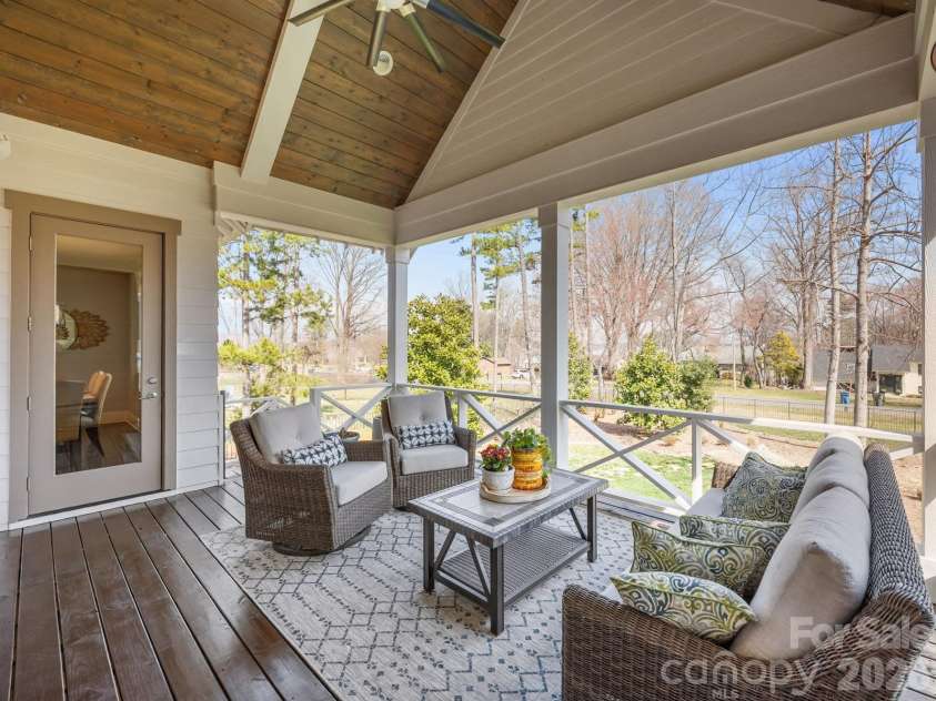 22304 John Gamble Road, Cornelius, NC 28031.  MLS# CAR4353501, YatesRealty ID 3169. Covered back porch with vaulted ceiling