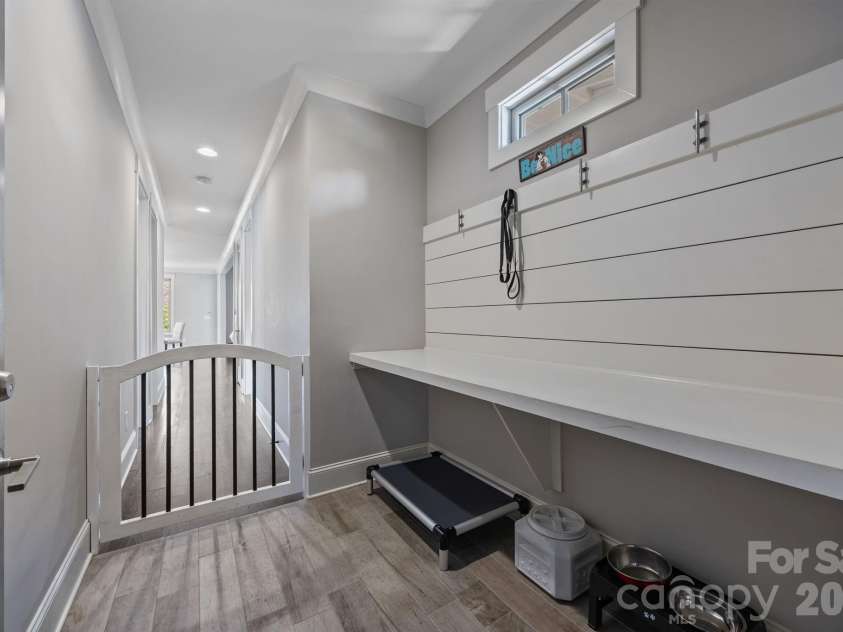 22304 John Gamble Road, Cornelius, NC 28031.  MLS# CAR4353501, YatesRealty ID 3169. Drop zone area off garage