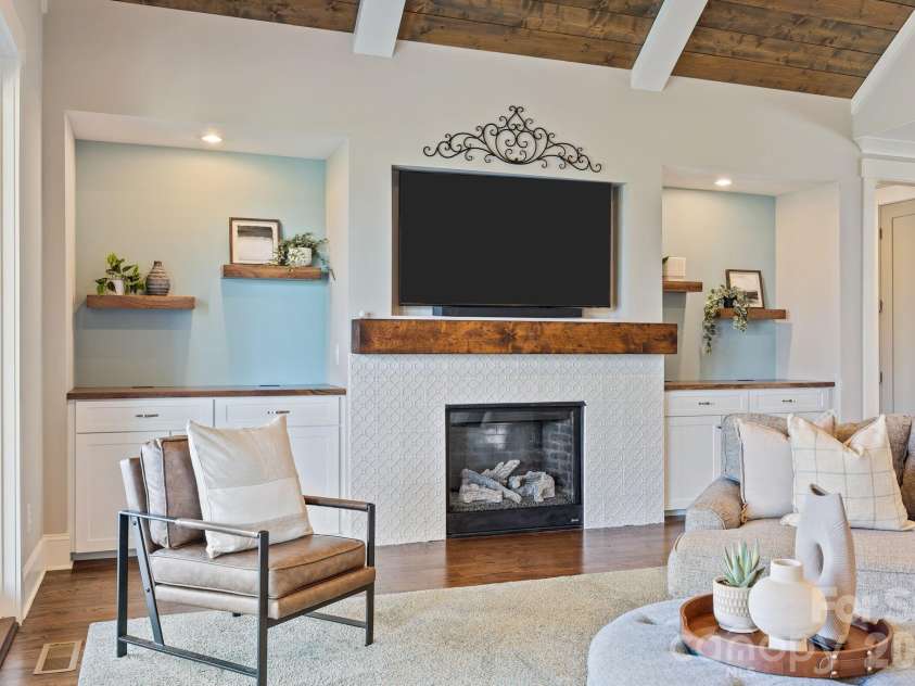 22304 John Gamble Road, Cornelius, NC 28031.  MLS# CAR4353501, YatesRealty ID 3169. Fireplace