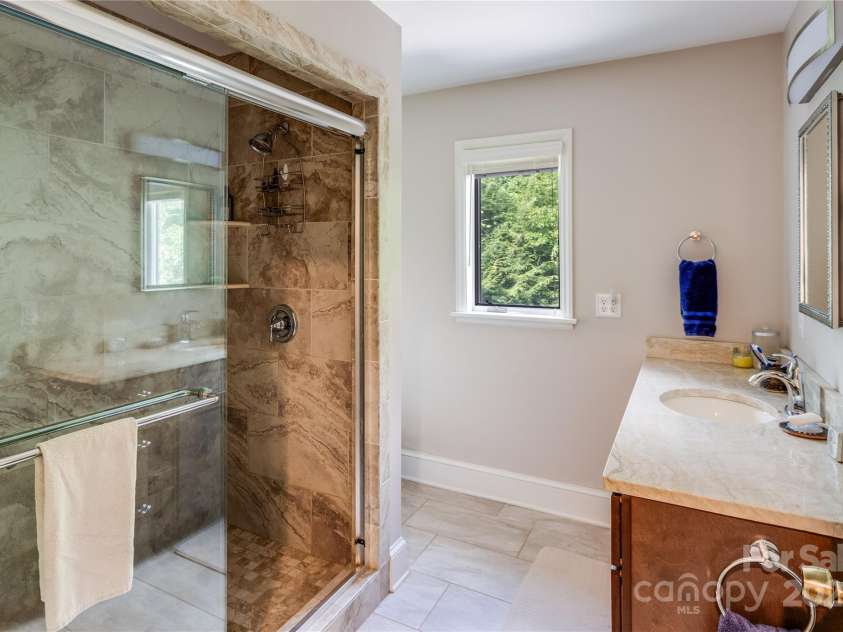 200 Crescent Drive, Lake Junaluska, NC 28745.  MLS# CAR4286284, YatesRealty ID 31693. Ensuite bath to upper level Primary Bedroom.