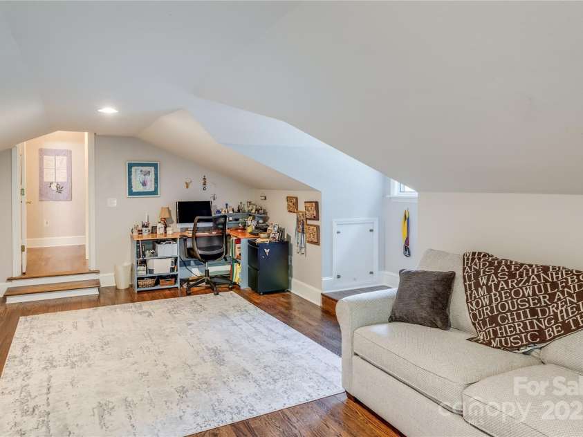 200 Crescent Drive, Lake Junaluska, NC 28745.  MLS# CAR4286284, YatesRealty ID 31693. What would you use this room for? This versatile room is on the upper level, loads of possibilities along with a wall full of closet space.