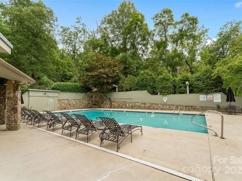1801 Timber Trail, Asheville, NC 28804.  MLS# CAR4288825, YatesRealty ID 31697. Gated pool next to clubhouse