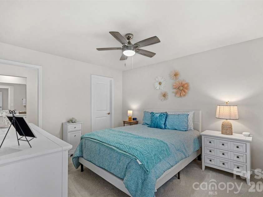 1969 Copper Path Drive, Fort Mill, SC 29715.  MLS# CAR4390791, YatesRealty ID 31699. Second floor bedroom with en suite bath