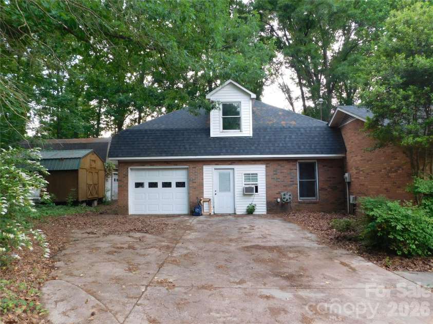 5509 Morgan Mill Road, Monroe, NC 28110.  MLS# CAR4343983, YatesRealty ID 3170. 2 car garage (One side enclosed but full 2 car inside)