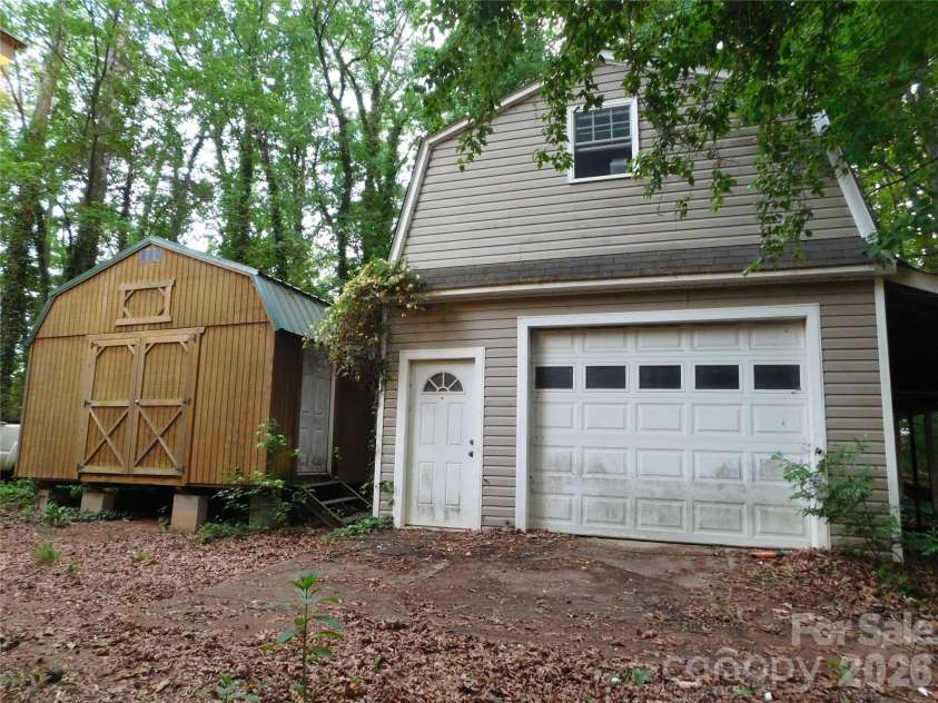5509 Morgan Mill Road, Monroe, NC 28110.  MLS# CAR4343983, YatesRealty ID 3170. 2 story garage