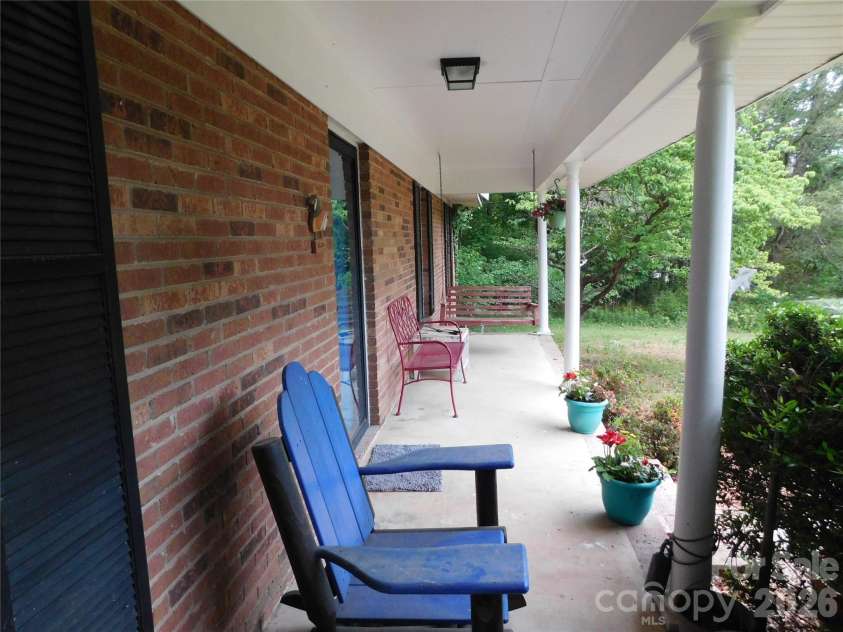 5509 Morgan Mill Road, Monroe, NC 28110.  MLS# CAR4343983, YatesRealty ID 3170. Covered front porch