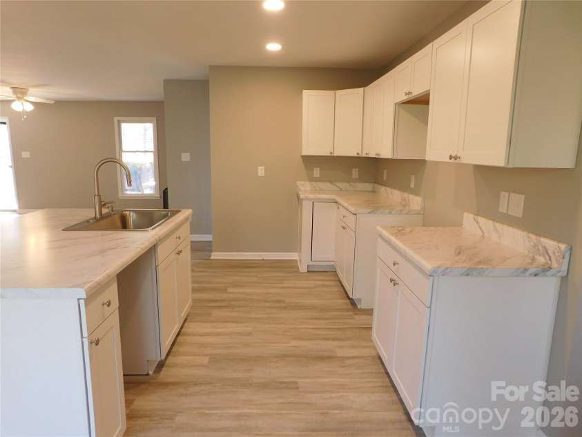 5509 Morgan Mill Road, Monroe, NC 28110.  MLS# CAR4343983, YatesRealty ID 3170. Kitchen from bay window area