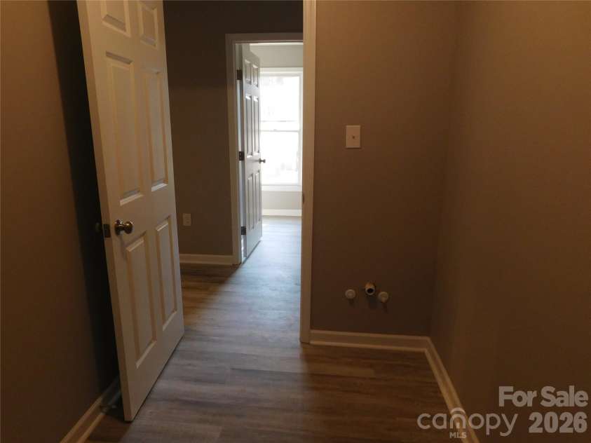 5509 Morgan Mill Road, Monroe, NC 28110.  MLS# CAR4343983, YatesRealty ID 3170. Laundry room