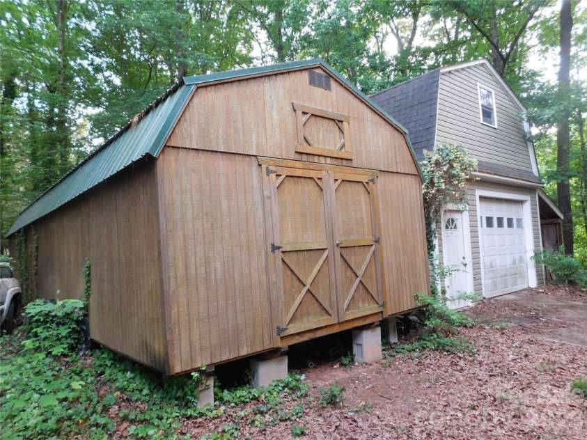 5509 Morgan Mill Road, Monroe, NC 28110.  MLS# CAR4343983, YatesRealty ID 3170. Storage bldg