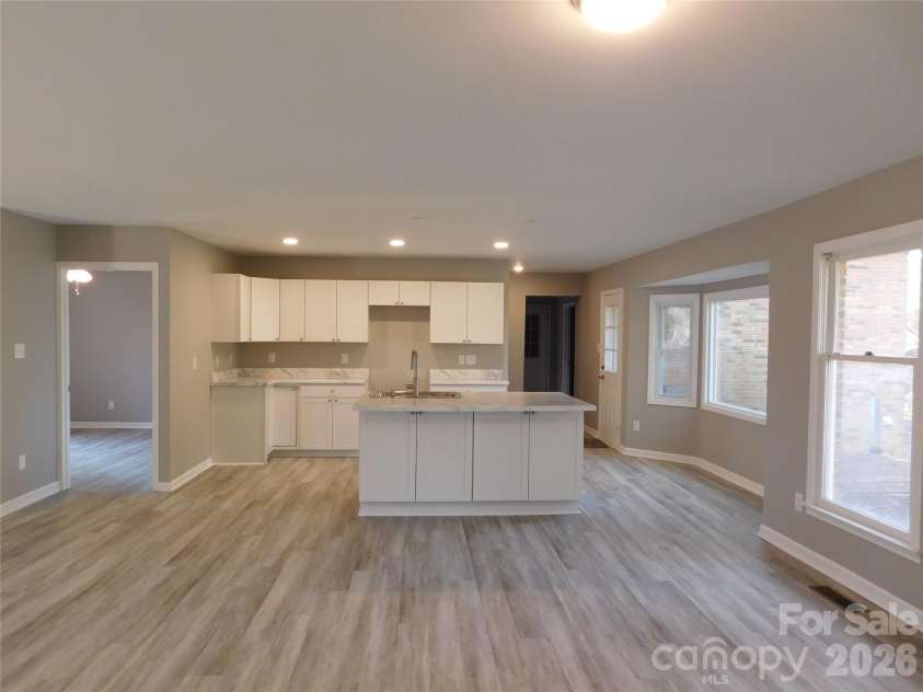 5509 Morgan Mill Road, Monroe, NC 28110.  MLS# CAR4343983, YatesRealty ID 3170. View from dining area into kitchen