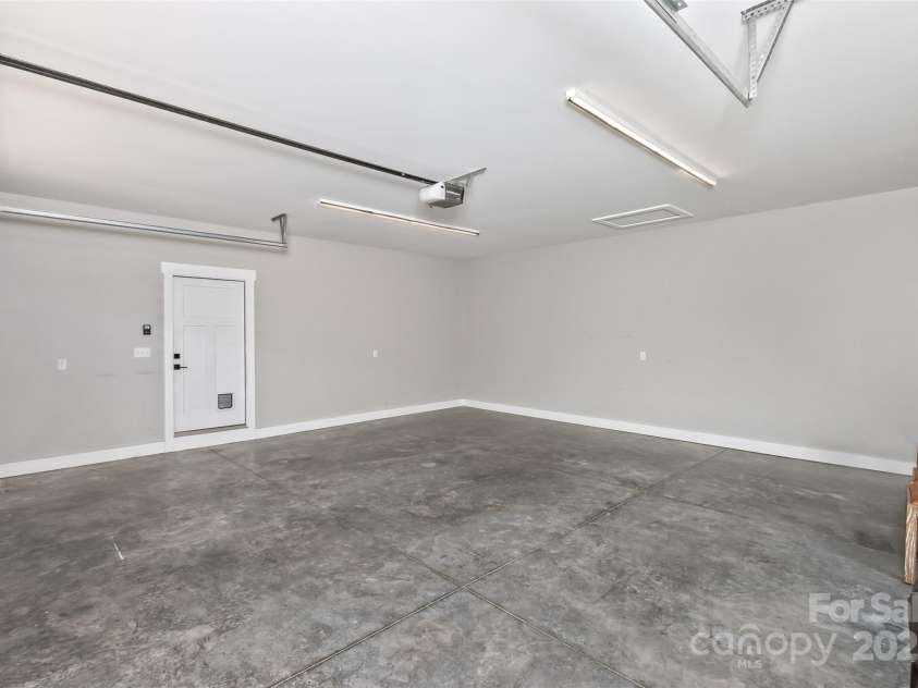 11 South Pine Drive, Weaverville, NC 28787.  MLS# CAR4274565, YatesRealty ID 31700. OVERSIZED GARAGE