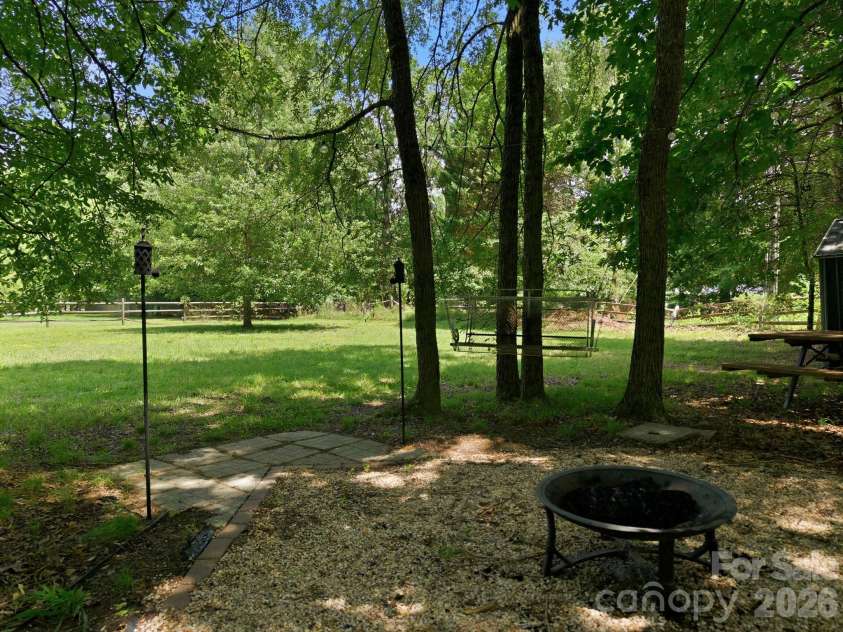 600 Gray Drive, Charlotte, NC 28213.  MLS# CAR4391536, YatesRealty ID 31700. Fire pit