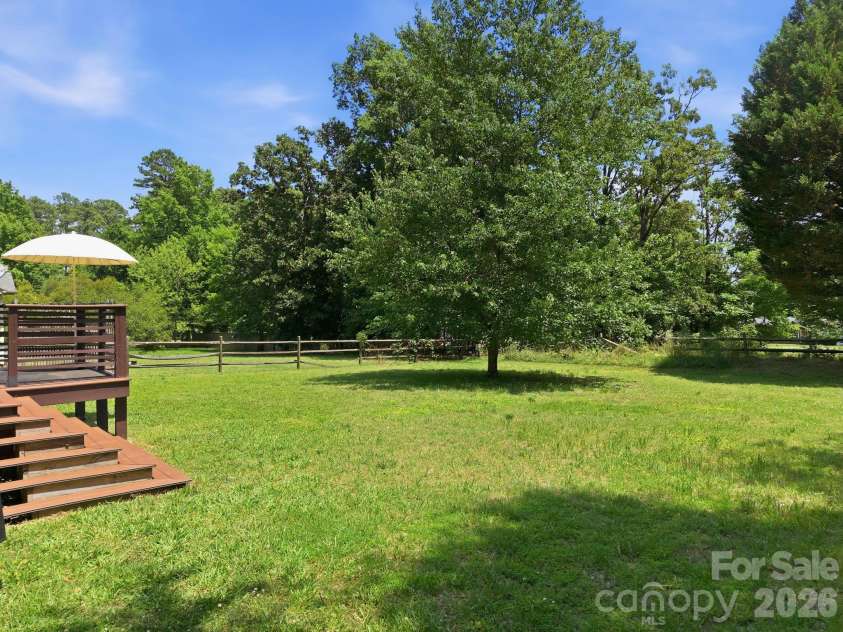 600 Gray Drive, Charlotte, NC 28213.  MLS# CAR4391536, YatesRealty ID 31700. Large level lot for entertaining