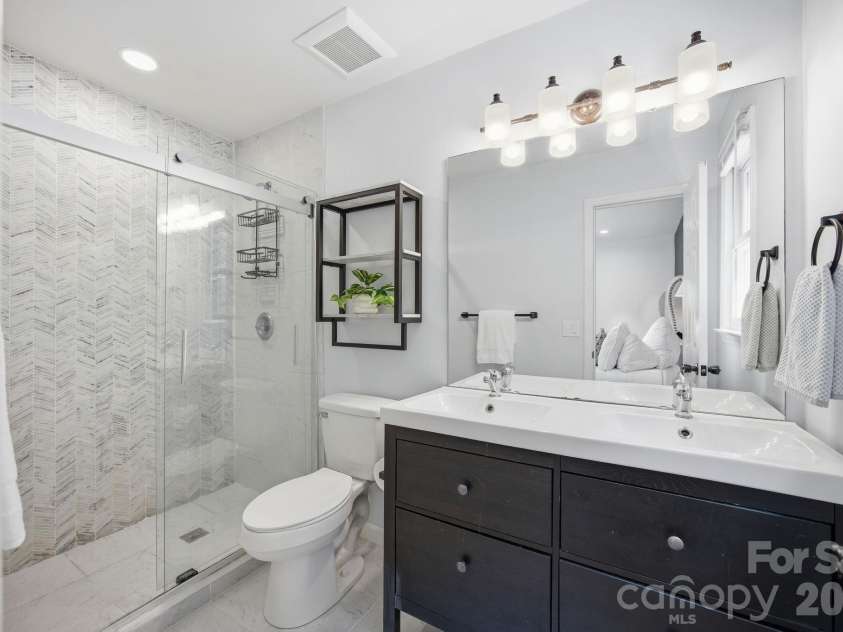 600 Gray Drive, Charlotte, NC 28213.  MLS# CAR4391536, YatesRealty ID 31700. Primary bath