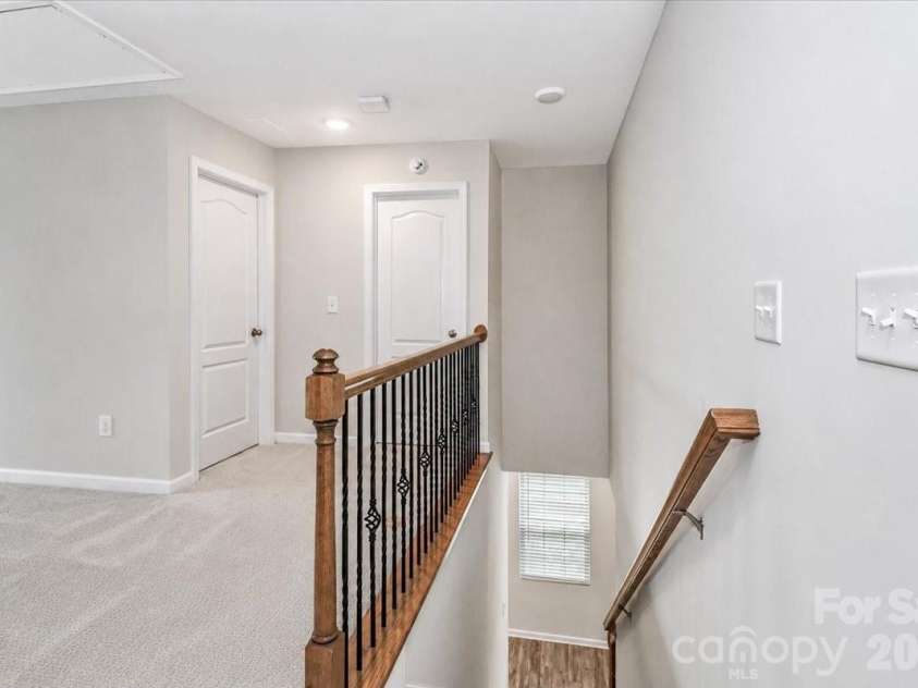 11320 Westbranch Parkway, Davidson, NC 28036.  MLS# CAR4392309, YatesRealty ID 31707. Hallway on upper level