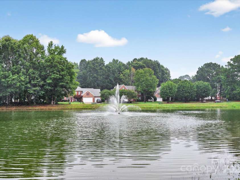 4713 Hanging Ivy Drive, Charlotte, NC 28215.  MLS# CAR4290401, YatesRealty ID 31707. Community Pond