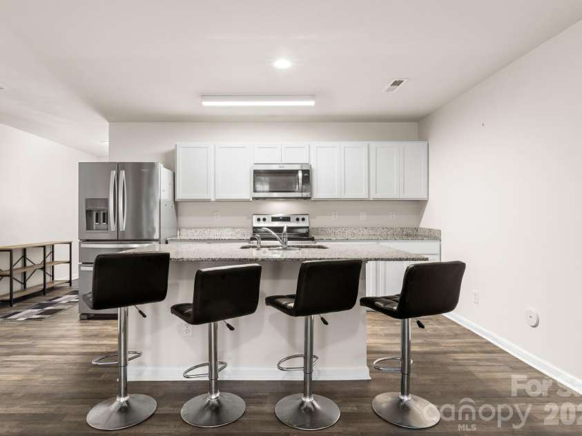 1455 Cypress Loop, Newton, NC 28658.  MLS# CAR4391323, YatesRealty ID 31724. Center Island Kitchen with Sink