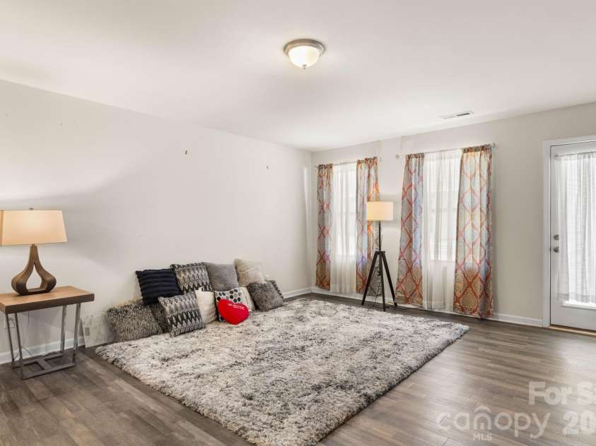 1455 Cypress Loop, Newton, NC 28658.  MLS# CAR4391323, YatesRealty ID 31724. Great Room. Open and Light Filled.