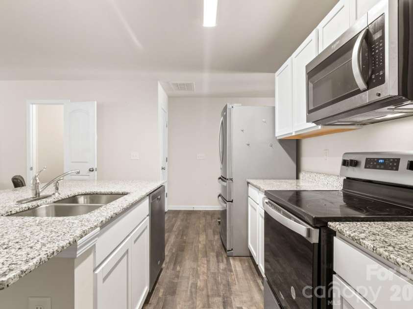 1455 Cypress Loop, Newton, NC 28658.  MLS# CAR4391323, YatesRealty ID 31724. Open Kitchen with SS Appliances