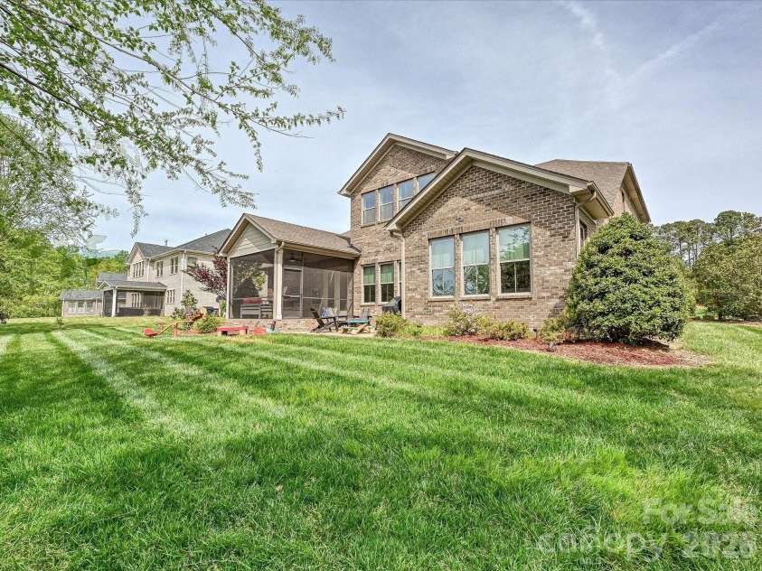 101 Enclave Boulevard, Matthews, NC 28104.  MLS# CAR4365874, YatesRealty ID 31731. Back of Home