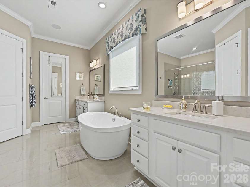 101 Enclave Boulevard, Matthews, NC 28104.  MLS# CAR4365874, YatesRealty ID 31731. Primary Bathroom