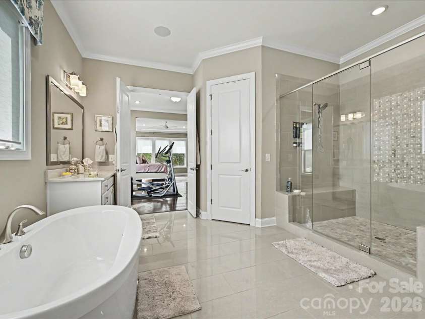 101 Enclave Boulevard, Matthews, NC 28104.  MLS# CAR4365874, YatesRealty ID 31731. Primary Bathroom