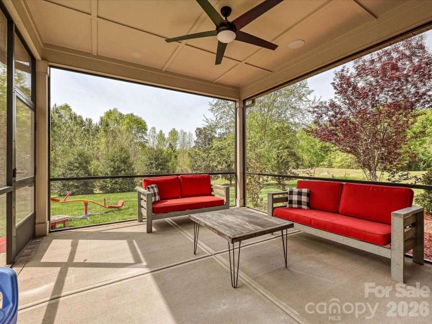 101 Enclave Boulevard, Matthews, NC 28104.  MLS# CAR4365874, YatesRealty ID 31731. Screened Porch