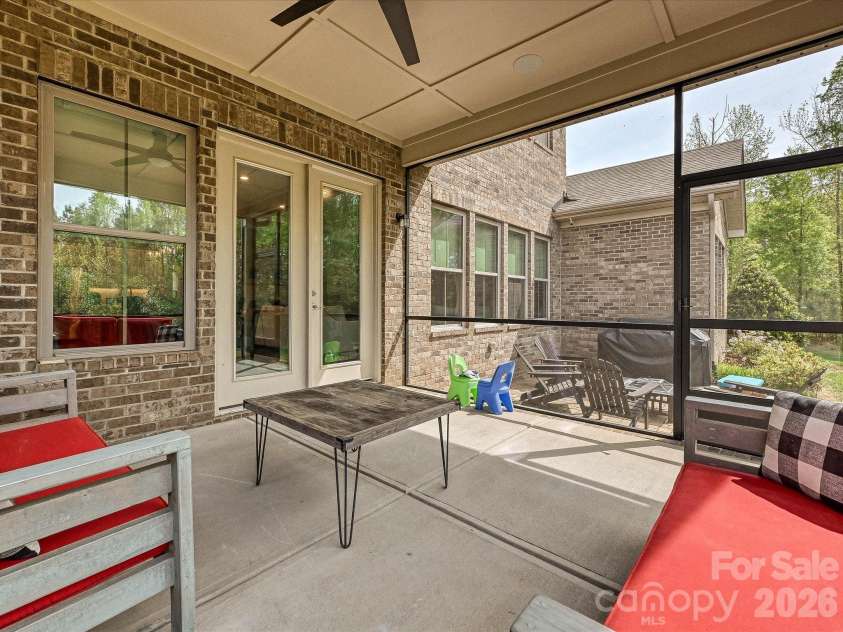 101 Enclave Boulevard, Matthews, NC 28104.  MLS# CAR4365874, YatesRealty ID 31731. Screened Porch