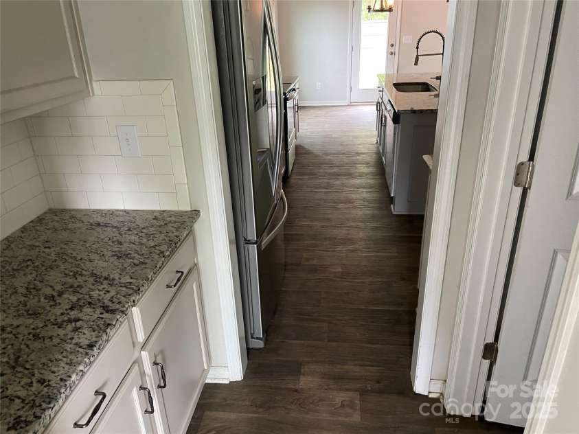 3079 Riker Street, Clover, SC 29710.  MLS# CAR4291601, YatesRealty ID 31731. Kitchen to Dining Rm